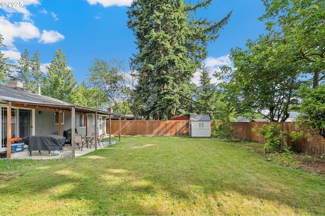1510 SE 143rd Ave, Portland, OR 97233 - fenced backyard with a storage unit and a patio