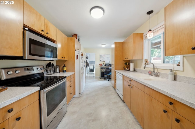 1510 SE 143rd Ave, Portland, OR 97233 - kitchen featuring appliances with stainless steel finishes, hanging light fixtures, and light brown cabinets