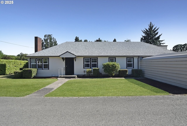 210 Holeman Ave, Eugene, OR 97404 - single story home featuring a chimney, a front yard, and a shingled roof