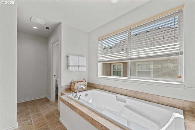 6638 NW Joss Ave, Portland, OR 97229 - full bathroom featuring a bath, toilet, and baseboards