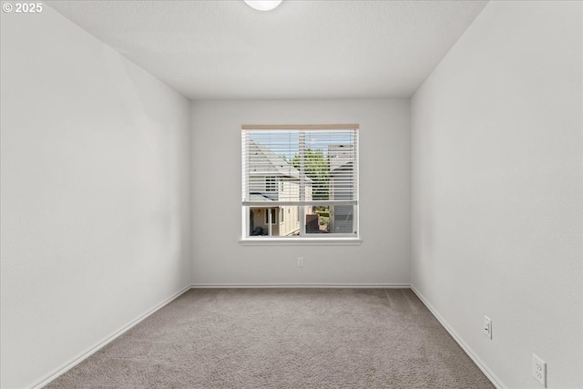 6638 NW Joss Ave, Portland, OR 97229 - carpeted spare room with baseboards