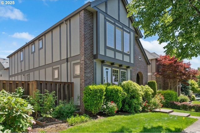 6638 NW Joss Ave, Portland, OR 97229 - view of side of property with board and batten siding and brick siding