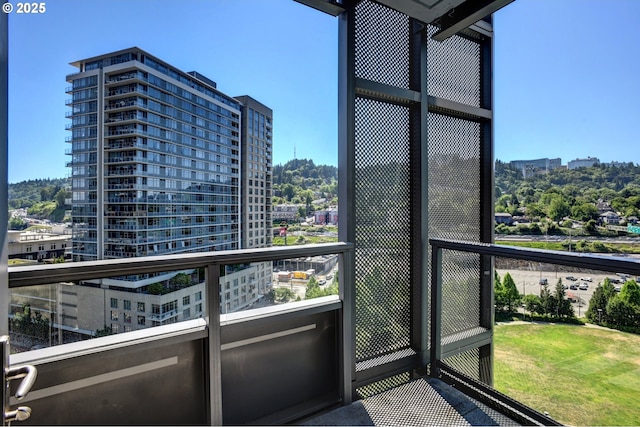 balcony featuring a city view
