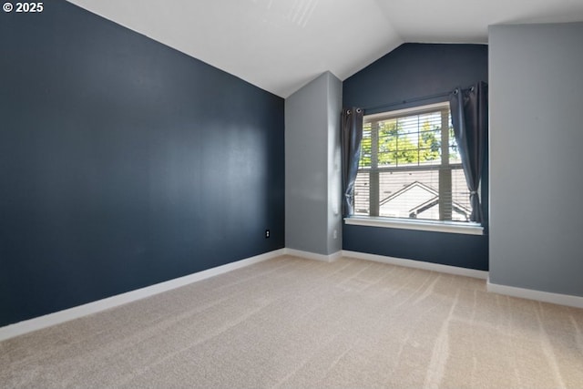 1919 NE 50th Way, Hillsboro, OR 97124 - carpeted empty room featuring vaulted ceiling and baseboards