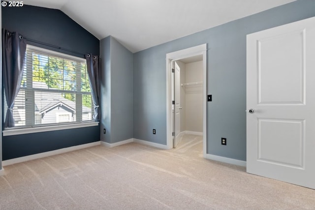 1919 NE 50th Way, Hillsboro, OR 97124 - unfurnished room with light carpet, vaulted ceiling, and baseboards