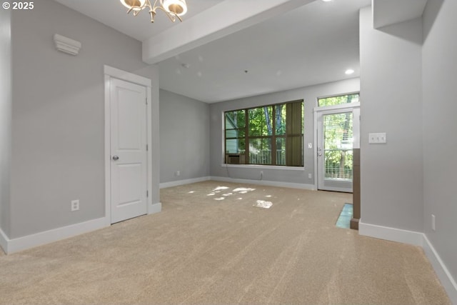 1919 NE 50th Way, Hillsboro, OR 97124 - carpeted empty room with a chandelier, beamed ceiling, baseboards, and recessed lighting