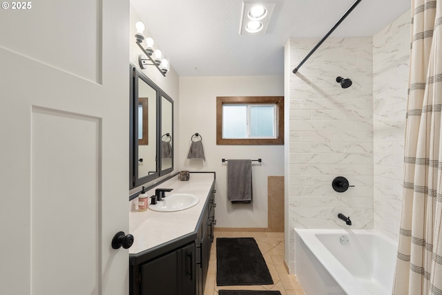 bathroom featuring shower / bath combo with shower curtain, tile patterned flooring, and vanity