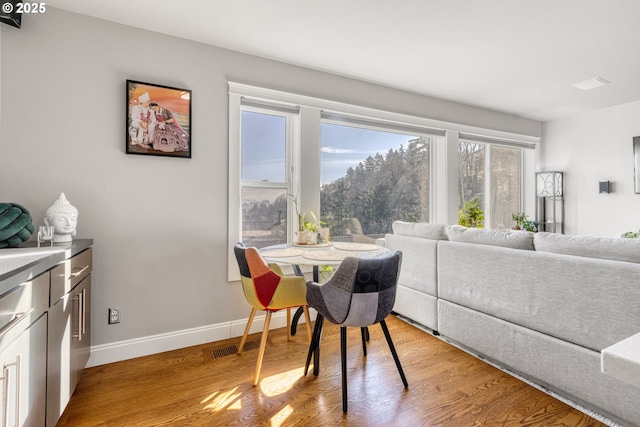 dining room featuring light wood-type flooring