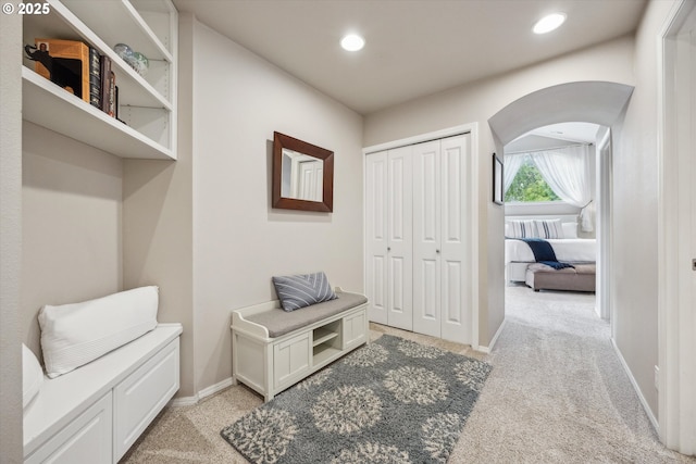19580 SW 56th Ct, Tualatin, OR 97062 - mudroom with arched walkways, light carpet, recessed lighting, and baseboards