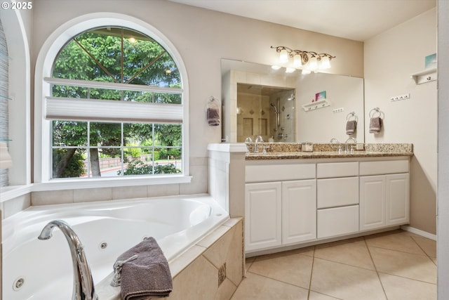 19580 SW 56th Ct, Tualatin, OR 97062 - bathroom featuring double vanity, tile patterned floors, a whirlpool tub, and tiled shower