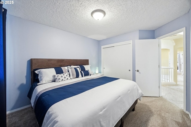 19580 SW 56th Ct, Tualatin, OR 97062 - carpeted bedroom featuring a closet and a textured ceiling