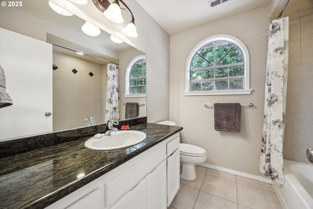 19580 SW 56th Ct, Tualatin, OR 97062 - bathroom featuring vanity, tile patterned flooring, toilet, shower / bath combination with curtain, and baseboards