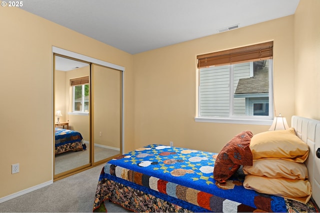 23804 SW Golden Pond Ter, Sherwood, OR 97140 - carpeted bedroom featuring baseboards and a closet