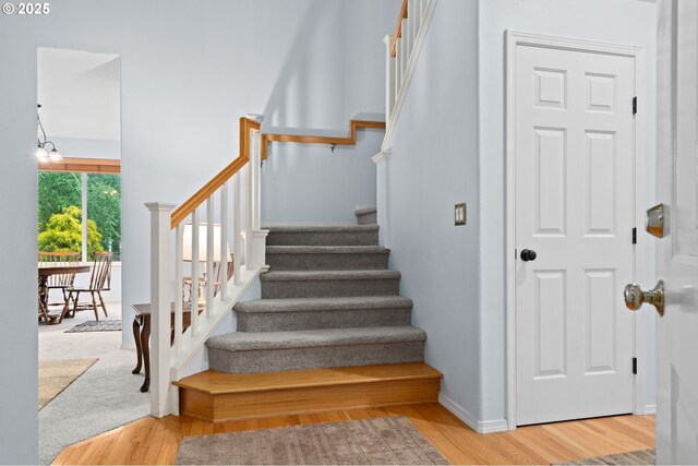 23804 SW Golden Pond Ter, Sherwood, OR 97140 - stairway featuring wood finished floors