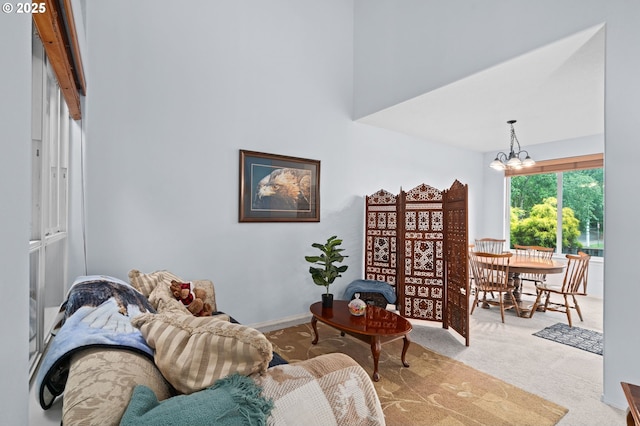 23804 SW Golden Pond Ter, Sherwood, OR 97140 - carpeted living room featuring a chandelier