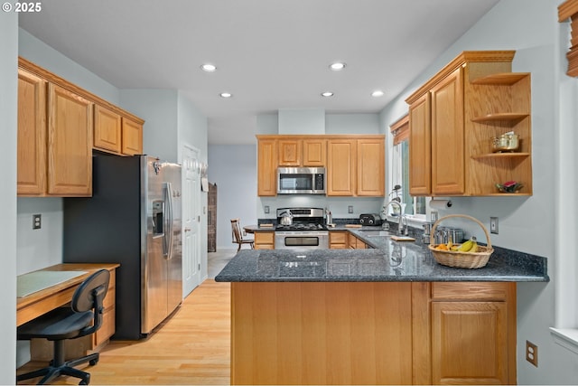23804 SW Golden Pond Ter, Sherwood, OR 97140 - kitchen with stainless steel appliances, a sink, open shelves, a peninsula, and light wood-type flooring