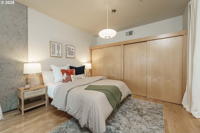 bedroom with light wood-style flooring