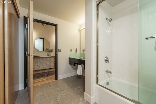 bathroom with baseboards and bathtub / shower combination