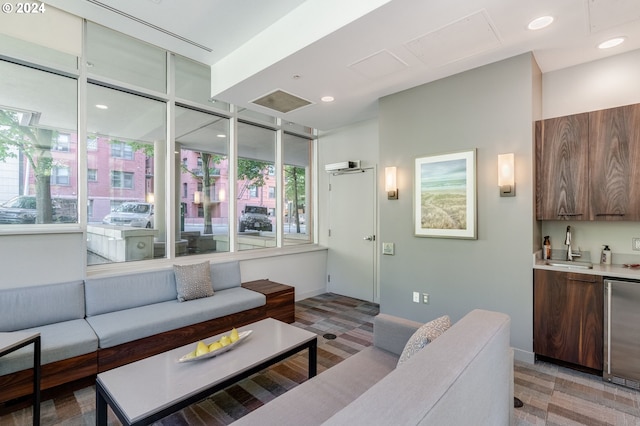 1500 SW 11th Ave Unit 1703, Portland, OR 97201 - living room featuring recessed lighting, indoor wet bar, and baseboards