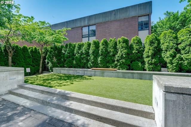 1500 SW 11th Ave Unit 1703, Portland, OR 97201 - exterior space featuring a front yard and brick siding