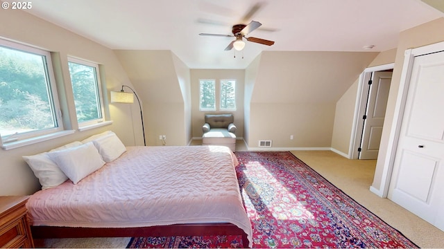 bedroom with multiple windows, carpet, visible vents, and baseboards