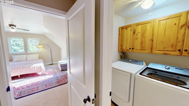 laundry area with cabinet space, independent washer and dryer, a ceiling fan, and light carpet