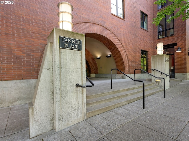 1030 NW Johnson St Unit 520, Portland, OR 97209 - doorway to property featuring brick siding