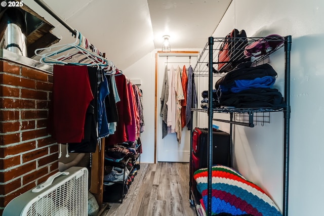 spacious closet featuring hardwood / wood-style floors