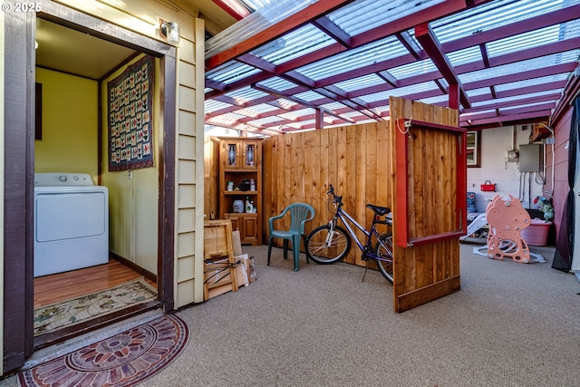 view of patio featuring washer / clothes dryer and a pergola