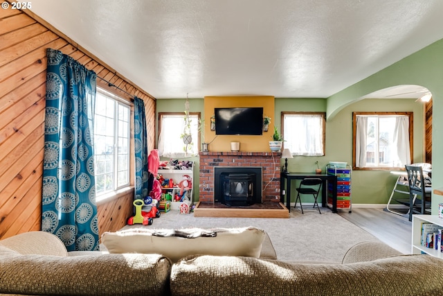 living room featuring carpet flooring and a textured ceiling