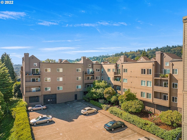4320 S Corbett Ave Unit 206, Portland, OR 97239 - view of building exterior with uncovered parking