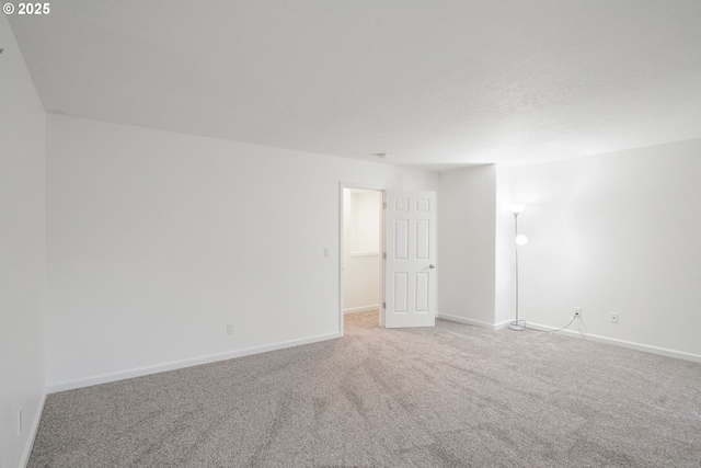 unfurnished room with carpet