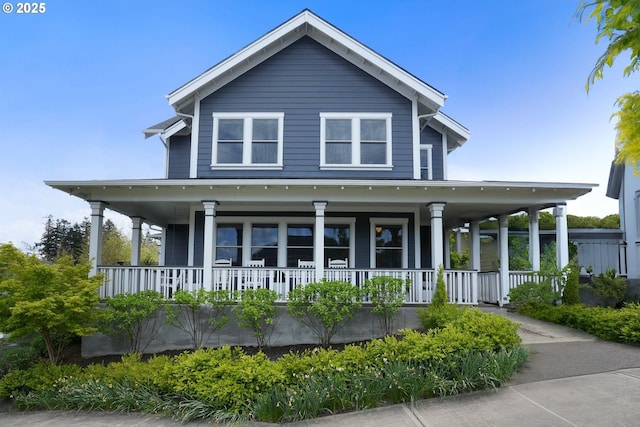 country-style home with covered porch