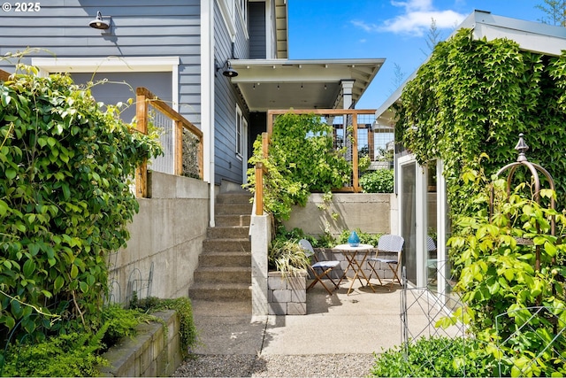 view of patio / terrace featuring stairs