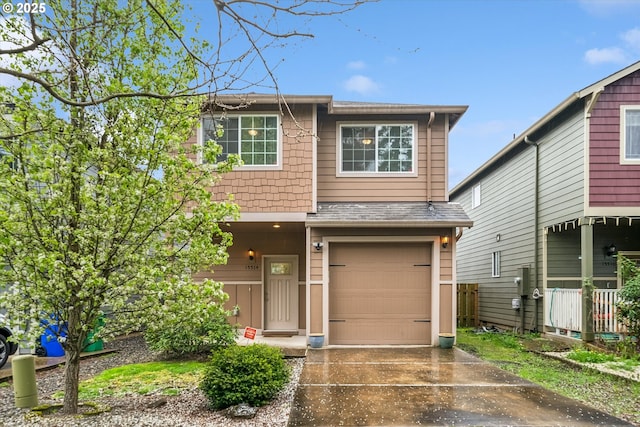 view of front of house with driveway and a garage