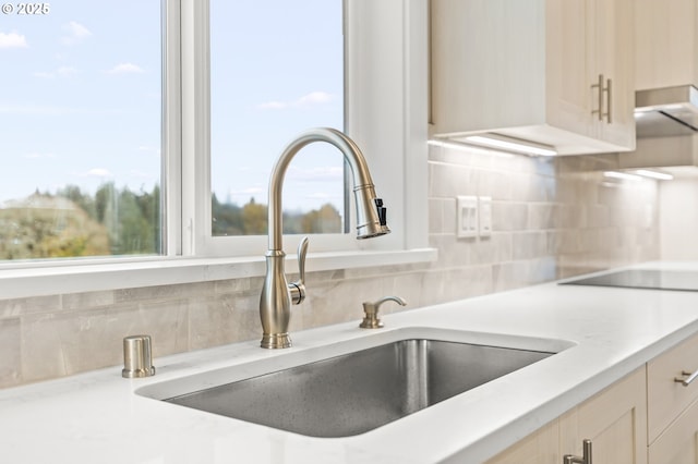 3200 N Abernathy Cir, Ridgefield, WA 98642 - kitchen view of a sink, tasteful backsplash, and light stone countertops