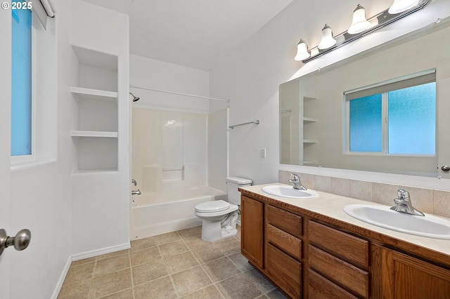 bathroom featuring toilet, double vanity, shower / washtub combination, and tile patterned flooring