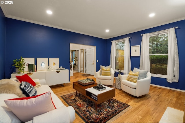 living room featuring crown molding and light hardwood / wood-style flooring