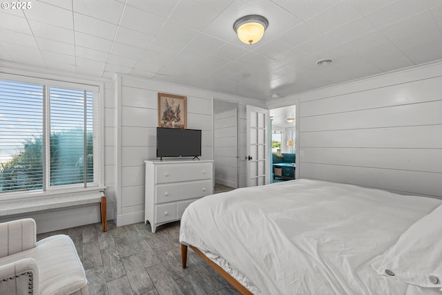 bedroom featuring wood finished floors