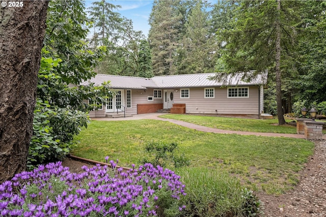7678 Pine Tree Ln SE, Turner, OR 97392 - back of house with a patio area, a yard, and metal roof