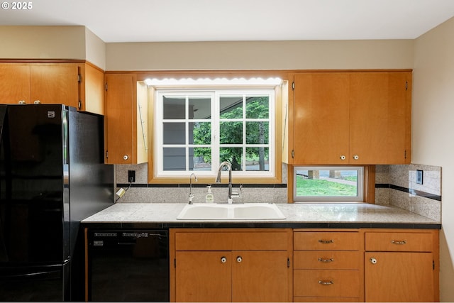 7678 Pine Tree Ln SE, Turner, OR 97392 - kitchen featuring black appliances, a sink, tasteful backsplash, and brown cabinetry