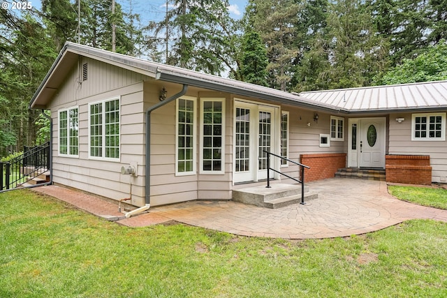 7678 Pine Tree Ln SE, Turner, OR 97392 - ranch-style house featuring a front yard, a patio area, and metal roof