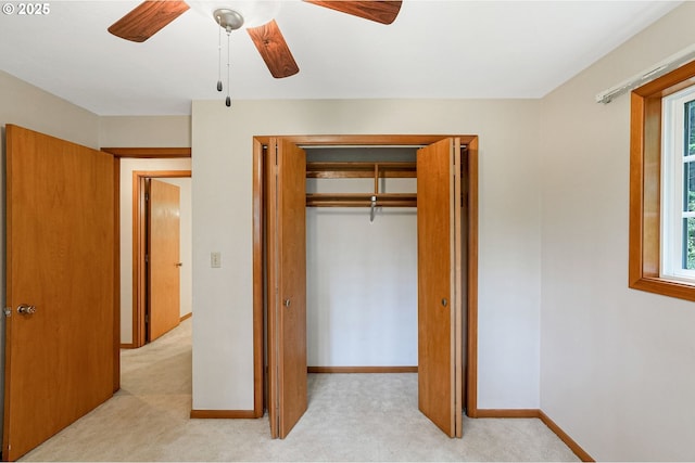 7678 Pine Tree Ln SE, Turner, OR 97392 - unfurnished bedroom featuring light colored carpet, a closet, ceiling fan, and baseboards