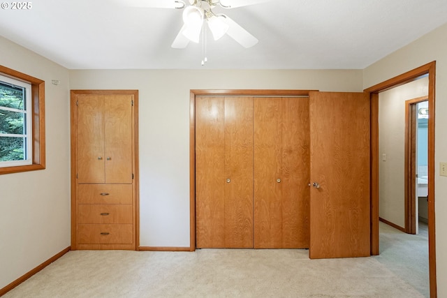 7678 Pine Tree Ln SE, Turner, OR 97392 - unfurnished bedroom featuring a closet, light carpet, baseboards, and ceiling fan