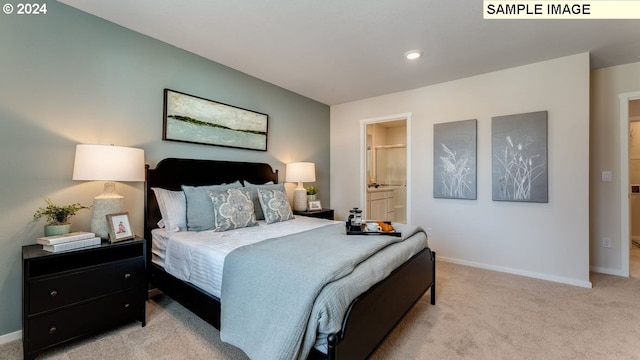 bedroom with baseboards and light colored carpet