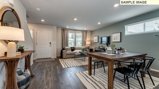 dining area with baseboards, dark wood-type flooring, visible vents, and recessed lighting