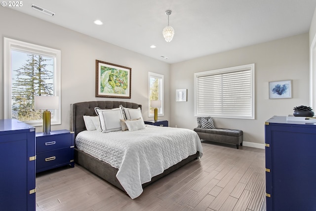 10397 SE Quail Ridge Dr, Happy Valley, OR 97086 - bedroom featuring light wood-style floors and recessed lighting