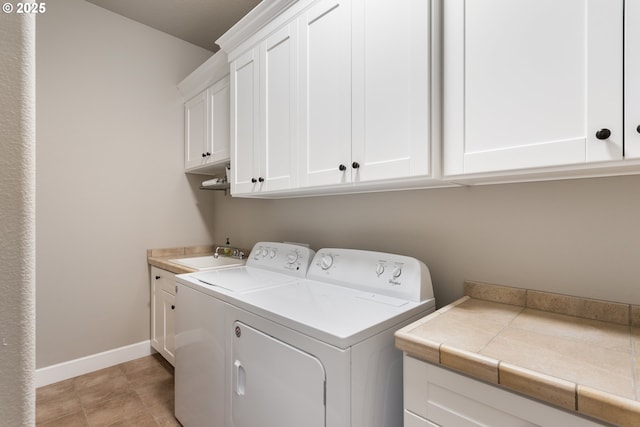 10397 SE Quail Ridge Dr, Happy Valley, OR 97086 - washroom with washing machine and dryer and cabinet space