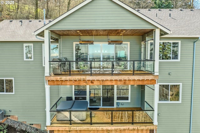 10397 SE Quail Ridge Dr, Happy Valley, OR 97086 - rear view of house with a balcony