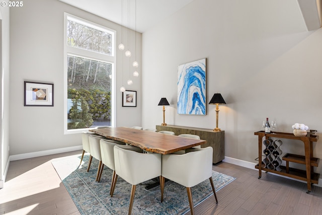 10397 SE Quail Ridge Dr, Happy Valley, OR 97086 - dining space featuring baseboards and wood finished floors